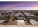 Beautiful single-story home featuring desert landscaping and a two-car garage in a quiet neighborhood at 31051 W Amelia Ave, Buckeye, AZ 85396