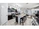 Beautiful kitchen with granite counters, stainless steel appliances, an island, and dark cabinets at 31051 W Amelia Ave, Buckeye, AZ 85396