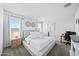 Bright, serene main bedroom with neutral tones and ample natural light at 31051 W Amelia Ave, Buckeye, AZ 85396