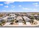 Aerial view of a residential neighborhood showcasing neatly arranged homes with desert landscape at 31051 W Amelia Ave, Buckeye, AZ 85396