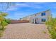 Large backyard featuring a covered patio with view of the home's exterior at 32347 N Vernal Ln, San Tan Valley, AZ 85144
