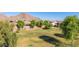 Large open green space is perfect for recreational activities and features mature shade trees at 32347 N Vernal Ln, San Tan Valley, AZ 85144