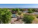 Neighborhood playground provides hours of enjoyment with slides and climbing structures surrounded by lush trees at 32347 N Vernal Ln, San Tan Valley, AZ 85144