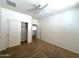 Carpeted bedroom featuring closet and ceiling fan at 33506 N 24Th Dr, Phoenix, AZ 85085