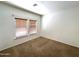 Bedroom featuring neutral carpeting and window at 33506 N 24Th Dr, Phoenix, AZ 85085