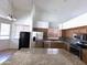 Well-equipped kitchen features stainless steel appliances, granite counters, and ample cabinet space at 33506 N 24Th Dr, Phoenix, AZ 85085