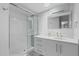 Modern bathroom featuring white cabinets and glass shower at 3402 E Sells Dr, Phoenix, AZ 85018