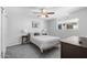 Cozy bedroom with a ceiling fan and natural light at 3402 E Sells Dr, Phoenix, AZ 85018