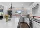 Bright, open kitchen featuring a spacious island, stainless steel appliances, and stylish finishes at 3402 E Sells Dr, Phoenix, AZ 85018