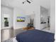Main bedroom features a mounted TV and convenient access to the bathroom at 3402 E Sells Dr, Phoenix, AZ 85018
