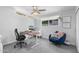 Comfortable home office with an ergonomic chair and plenty of natural light at 3402 E Sells Dr, Phoenix, AZ 85018