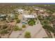 Wide aerial view shows the property's pool and lush landscaping nestled in a peaceful desert community at 35108 N 139Th Way, Scottsdale, AZ 85262