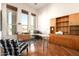 Bright home office with large windows, wood floors, and ample storage at 35108 N 139Th Way, Scottsdale, AZ 85262