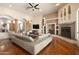 Elegant living room with modern furnishings, fireplace, and stylish decor at 35108 N 139Th Way, Scottsdale, AZ 85262