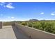 This rooftop deck boasts panoramic views of desert landscape and distant mountains at 35108 N 139Th Way, Scottsdale, AZ 85262