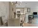 Bright dining area flowing into the kitchen with modern appliances and stylish design at 3633 N 3Rd Ave # 1035, Phoenix, AZ 85013