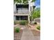 Modern home exterior with a balcony, beautiful landscaping, walkway, and a contemporary design at 3633 N 3Rd Ave # 1035, Phoenix, AZ 85013