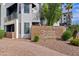 Inviting exterior of condo building with desert landscaping and brick signage at 3633 N 3Rd Ave # 1035, Phoenix, AZ 85013