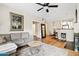 Inviting living room with a ceiling fan, hardwood floors, and an open concept floorplan at 3633 N 3Rd Ave # 1035, Phoenix, AZ 85013