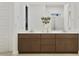 Bathroom vanity with double sinks, sleek wooden cabinets, and modern fixtures create a serene and functional space at 3758 E Gold Mountain Ave, San Tan Valley, AZ 85143