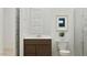Clean and modern bathroom with a vanity, toilet, framed art and a glass-enclosed shower at 3758 E Gold Mountain Ave, San Tan Valley, AZ 85143