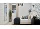 Stylish bedroom features a comfortable bed, accent wall, and ample natural light creating a relaxing and inviting space at 3758 E Gold Mountain Ave, San Tan Valley, AZ 85143
