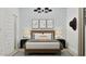 Charming bedroom featuring a bed, decorative pillows, and stylish wall art at 3758 E Gold Mountain Ave, San Tan Valley, AZ 85143
