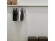 Well-organized closet with hanging clothes and stylish storage benches offers a practical and visually appealing space at 3758 E Gold Mountain Ave, San Tan Valley, AZ 85143