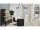 Modern office space with sleek desk, stylish chair, and ample storage offers a functional and visually appealing workspace at 3758 E Gold Mountain Ave, San Tan Valley, AZ 85143