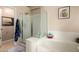 Bright bathroom showcasing a walk-in shower and a separate bathtub at 4038 E Wrangler Ct, Gilbert, AZ 85297