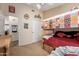 Comfortable bedroom with wooden bunk beds and view of an adjacent room at 4038 E Wrangler Ct, Gilbert, AZ 85297
