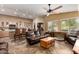 Open concept living space with tile floors, connecting the kitchen and dining area at 4038 E Wrangler Ct, Gilbert, AZ 85297