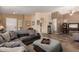 Spacious living room with neutral colors and modern tile floors with multiple seating areas at 4038 E Wrangler Ct, Gilbert, AZ 85297