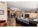 Bright and open living room featuring multiple seating areas and tile floors at 4038 E Wrangler Ct, Gilbert, AZ 85297