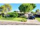 Charming single-story home featuring a well-manicured lawn and mature landscaping at 4139 E Edgemont Ave, Phoenix, AZ 85008