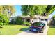Inviting home showcasing lush greenery and a well-kept lawn at 4139 E Edgemont Ave, Phoenix, AZ 85008