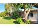 Attractive yard adorned with colorful flowers and vibrant greenery at 4139 E Edgemont Ave, Phoenix, AZ 85008