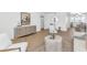 Inviting living room featuring stylish furniture, light wood floors and natural light at 4201 E Camelback Rd # 70, Phoenix, AZ 85018