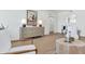 Elegant living room featuring a modern dresser, tasteful artwork, and comfortable seating, creating an inviting atmosphere at 4201 E Camelback Rd # 70, Phoenix, AZ 85018