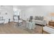 Inviting living room showcasing a comfortable sofa, modern decor, and an open layout with seamless flow to the dining area at 4201 E Camelback Rd # 70, Phoenix, AZ 85018