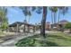 Community pool area featuring a covered pavilion and landscaped surroundings at 4201 E Camelback Rd # 70, Phoenix, AZ 85018