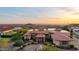 Custom home boasts mountain views, a circular driveway, fountains, mature landscaping, and a tile roof at 4328 N Pinnacle Ridge Cir, Mesa, AZ 85207