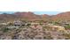 Aerial view of estate in community with private pool, spa, and desert surroundings at 4328 N Pinnacle Ridge Cir, Mesa, AZ 85207