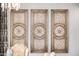 Ornate decorative wall panels adding a touch of elegance to the dining room at 4328 N Pinnacle Ridge Cir, Mesa, AZ 85207
