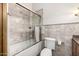 Bathroom showcasing a jacuzzi tub with a glass door, toilet, and vanity with sink at 4328 N Pinnacle Ridge Cir, Mesa, AZ 85207