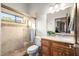 Bathroom showcasing a glass enclosed shower, toilet, vanity, and a neutral color palette at 4328 N Pinnacle Ridge Cir, Mesa, AZ 85207
