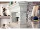 Cozy fireplace with a decorative mantel and stone surround creates a warm focal point in the living space at 4328 N Pinnacle Ridge Cir, Mesa, AZ 85207