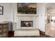 Cozy fireplace with a decorative mantel and stone surround creates a warm focal point in the living space at 4328 N Pinnacle Ridge Cir, Mesa, AZ 85207