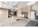 Spacious garage with ample storage cabinets, epoxy floors and plenty of room for vehicles and projects at 4328 N Pinnacle Ridge Cir, Mesa, AZ 85207