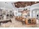 Spacious kitchen with wooden cabinets, large island with barstool seating, and stainless steel appliances at 4328 N Pinnacle Ridge Cir, Mesa, AZ 85207